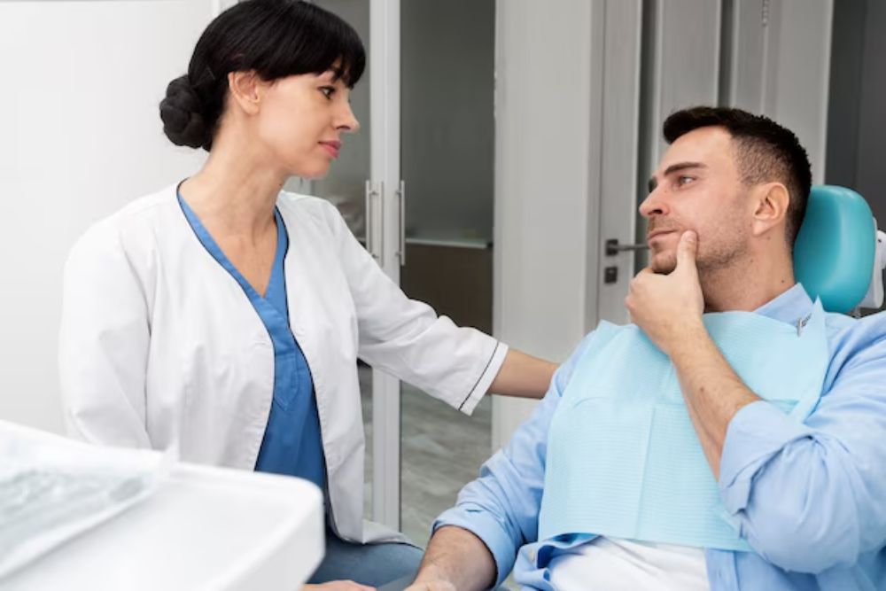 dentist providing emergency dental treatment